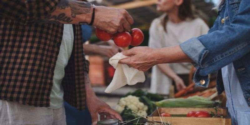 Man buying products from his local farmer.