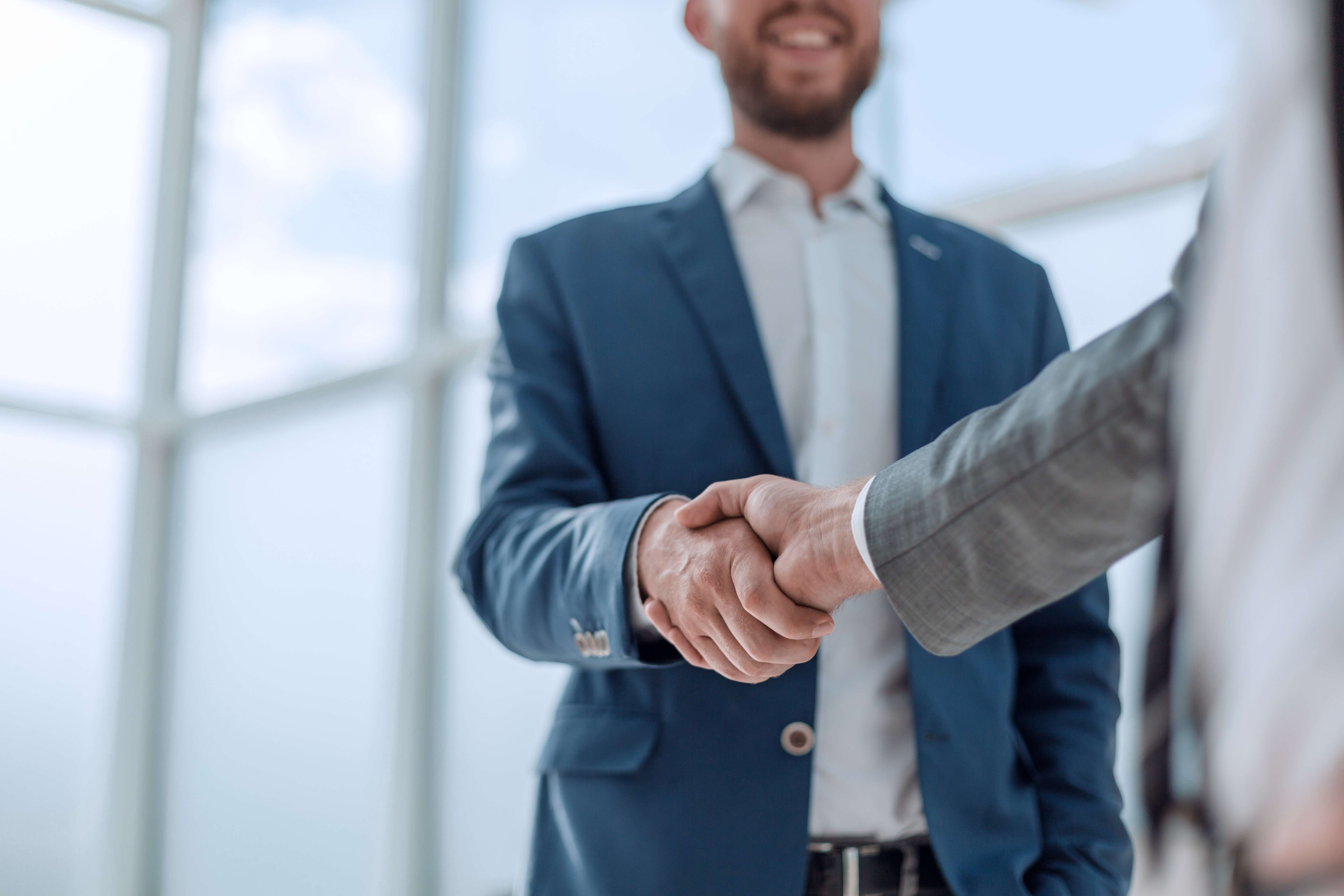 Businessmen Shaking Hands.