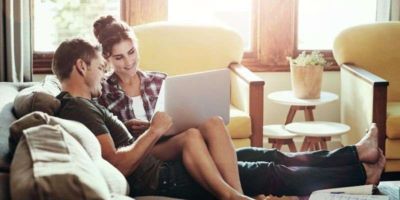 Couple learning about home equity loans and HELOCs.