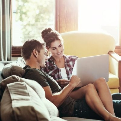 Couple deciding if a home equity loan or HELOC is better for them.